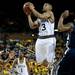 Michigan sophomore Trey Burke shoots in the second half of the game against Penn State on Sunday, Feb. 17. Michigan won 79-71. Daniel Brenner I AnnArbor.com